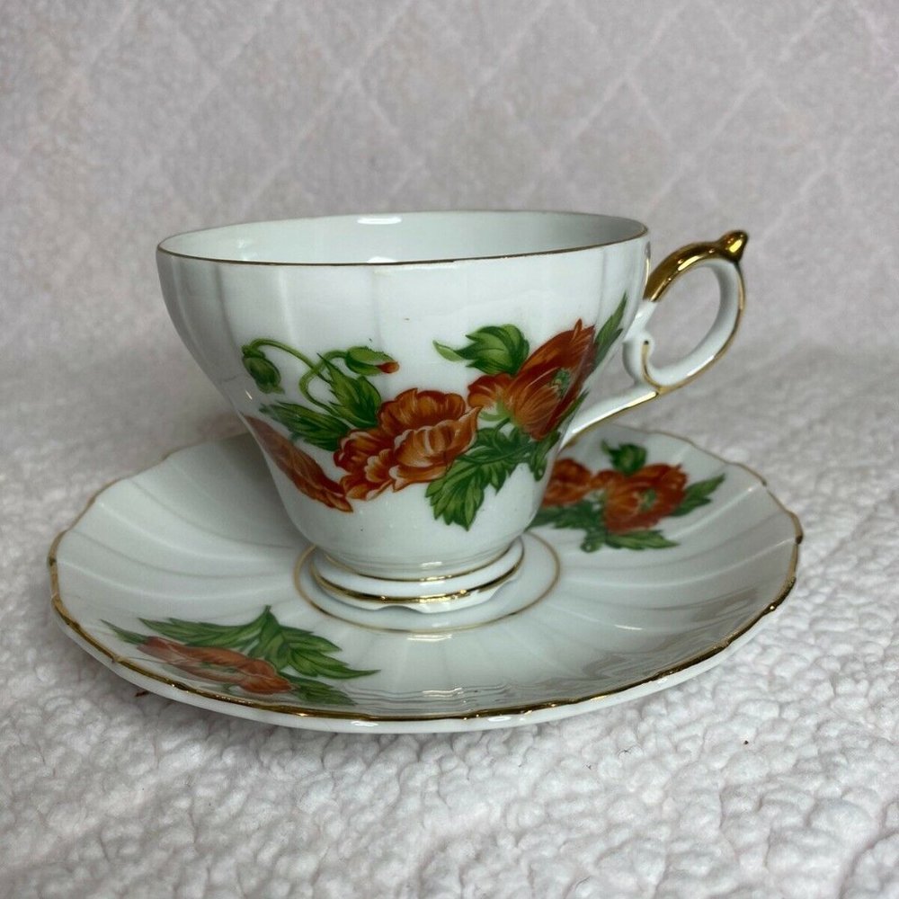ANTIQUE DELPHINE BONE CHINA TEA CUP & SAUCER PURPL